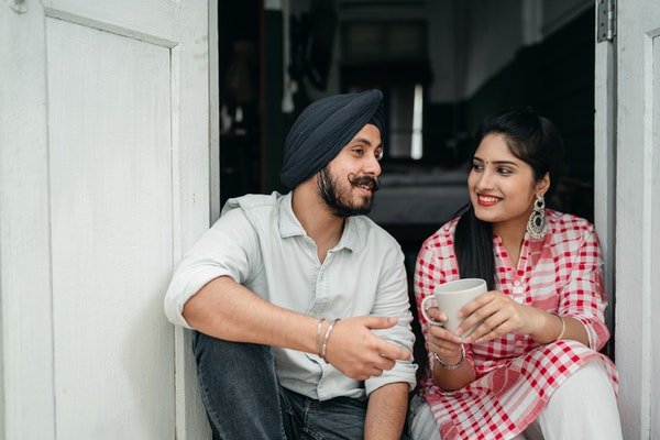 a man and lady talking to each other showing the concept of how to speak Indian languages fluently